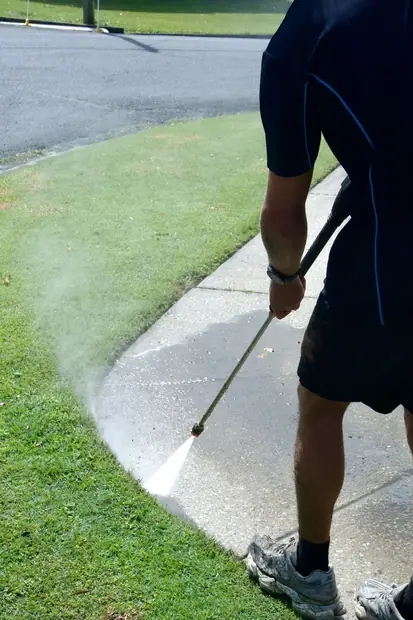 High pressure cleaning a pathway in Southport, Gold Coast