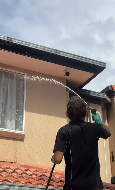 Rendered wall cleaned of mould and mildew in Clear Island Waters, Gold Coast