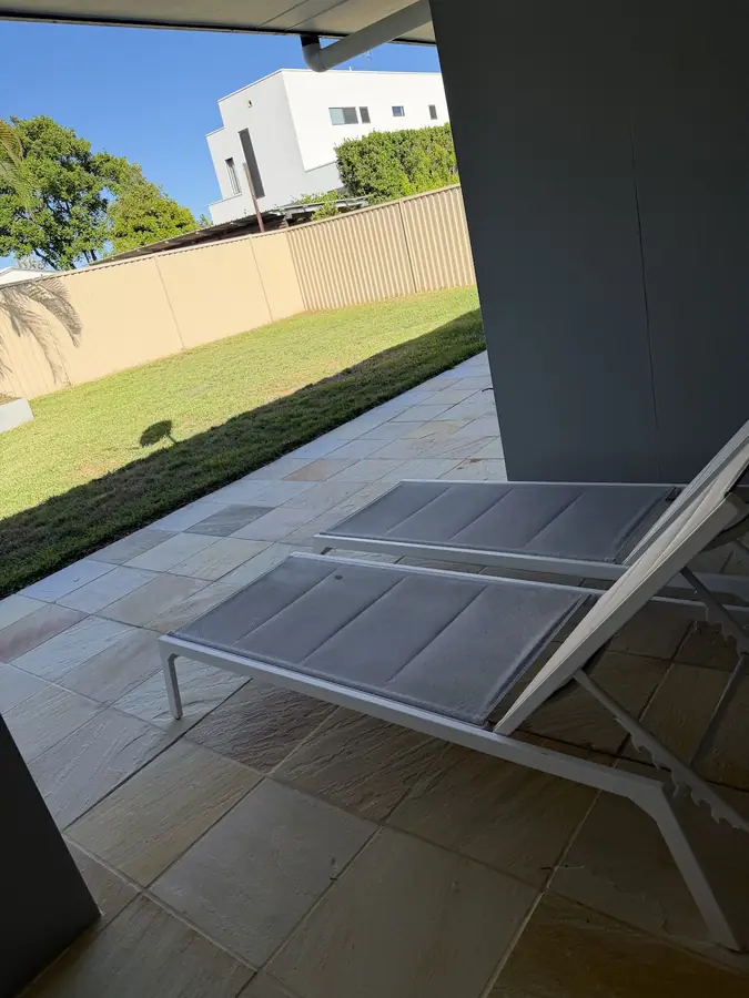 Cleaned sandstone paved patio and outdoor area at a Mermaid Waters home