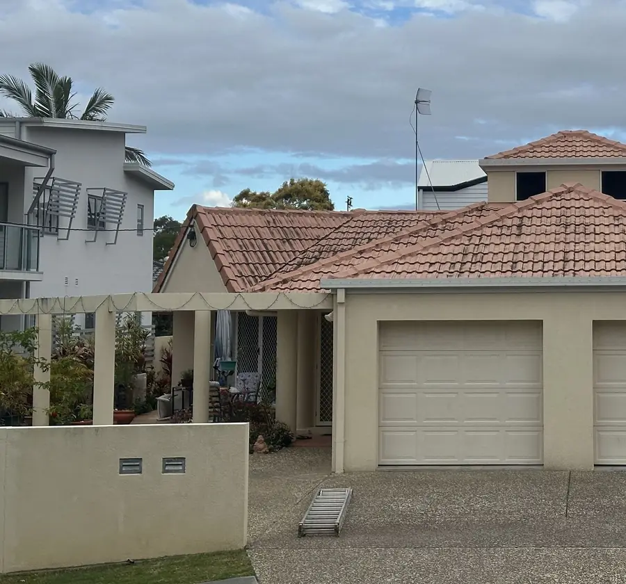 Tile roof washing in progress on a Gold Coast home